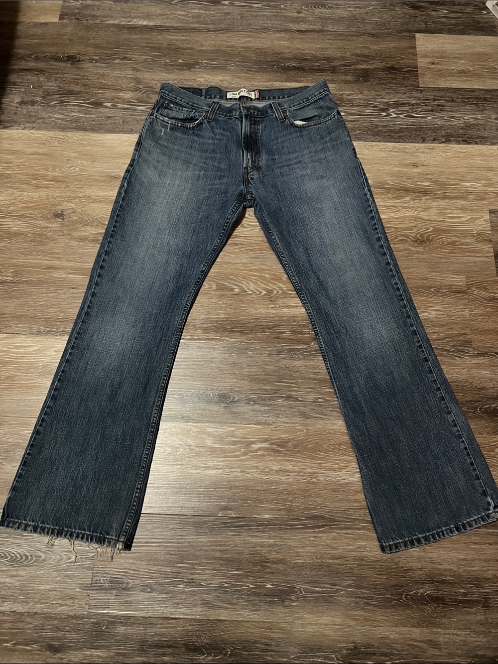 Levi's Dark Blue Bootcut Jeans with Subtle Fading